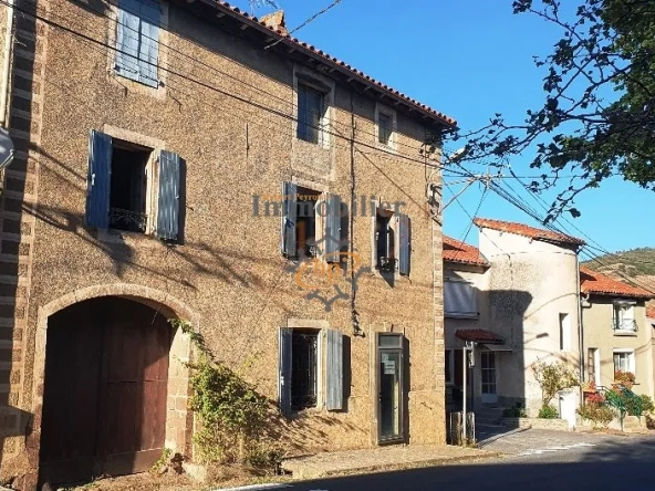 Maison de village à rénover avec garage et terrain non attenant