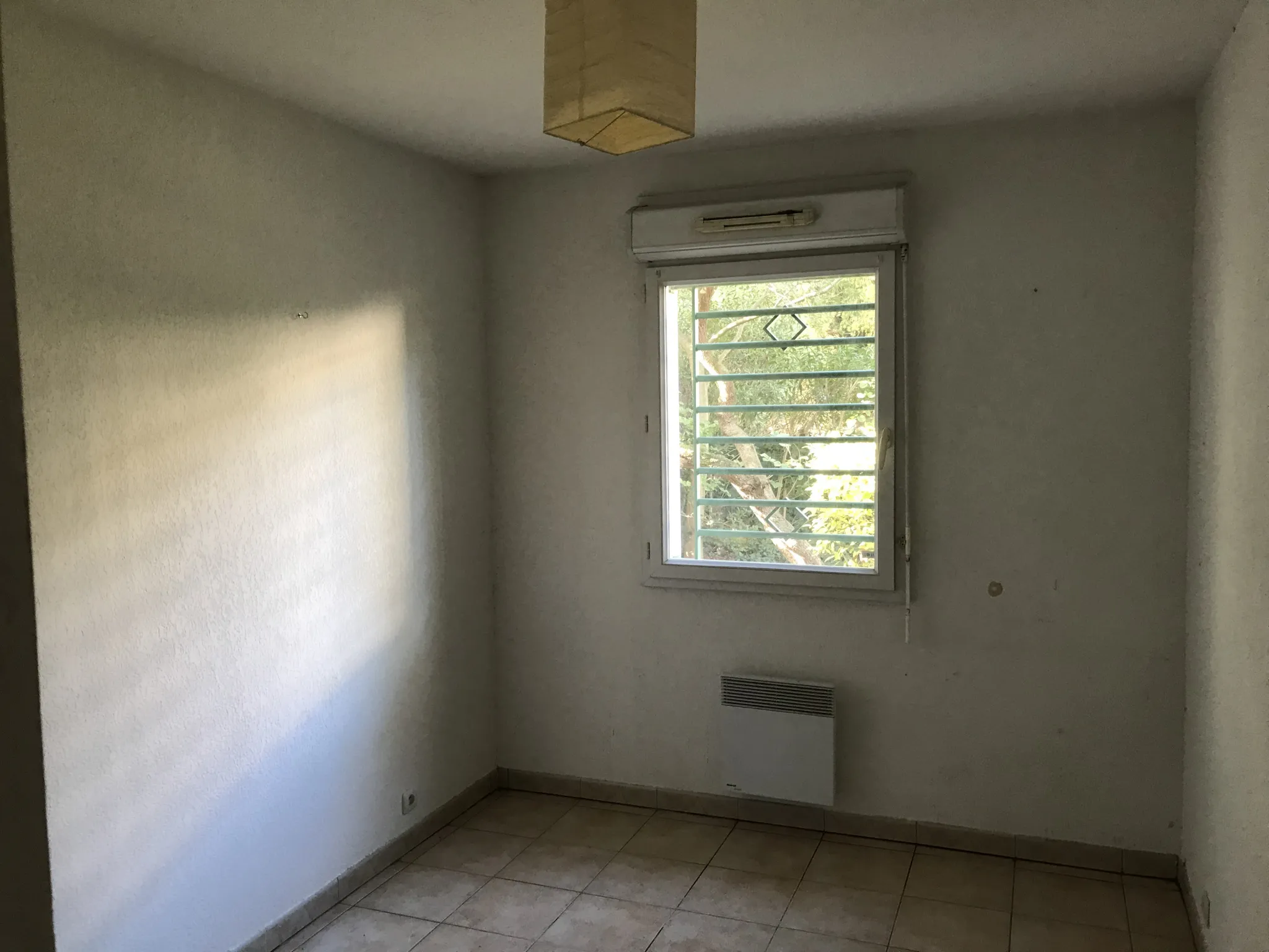 Appartement avec terrasse dans résidence sécurisée à Nimes 