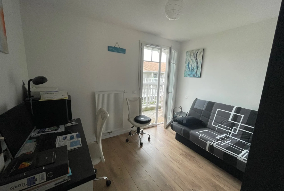 Appartement T3 traversant avec 2 balcons et un parking couvert 