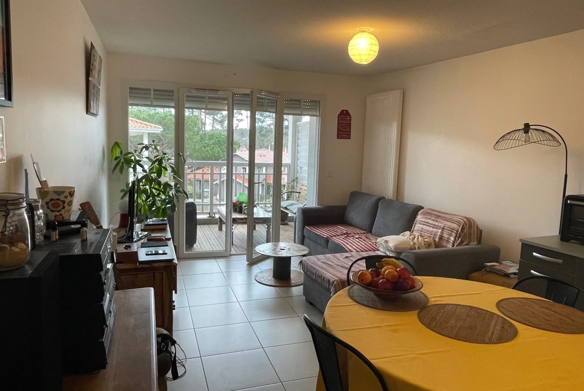 Appartement T3 traversant avec 2 balcons et un parking couvert 