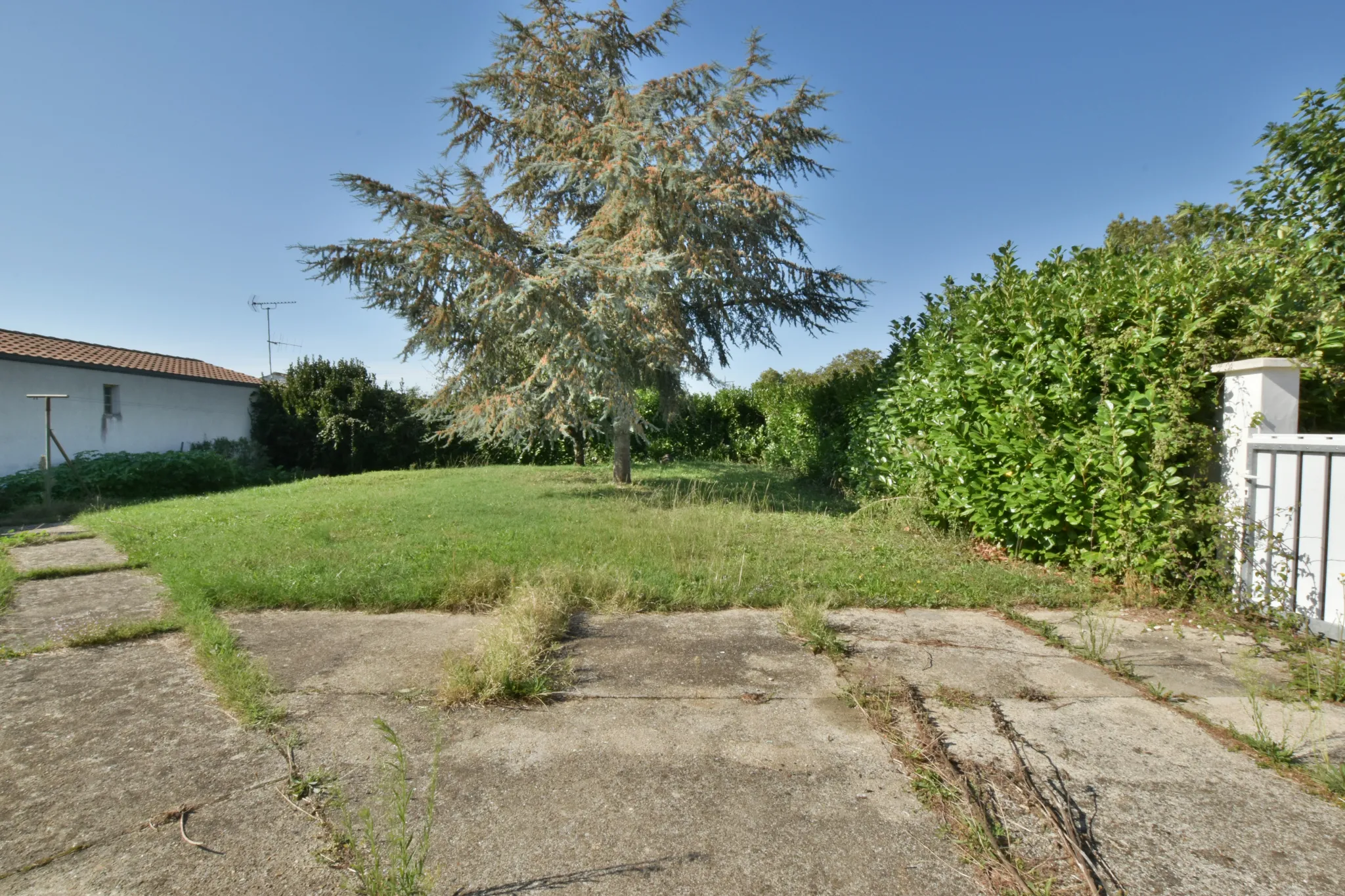 Maison plain-pied centre ville avec jardin et garage 