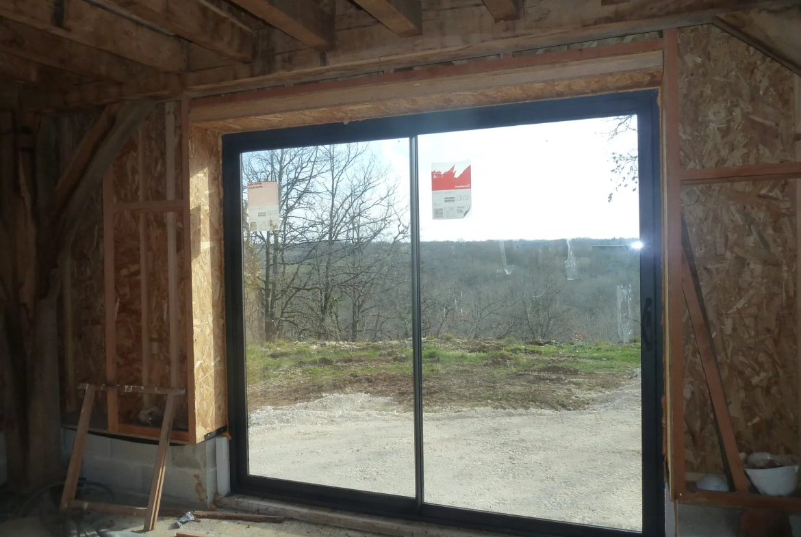 Maison ossature bois à rénover au cœur de la nature 