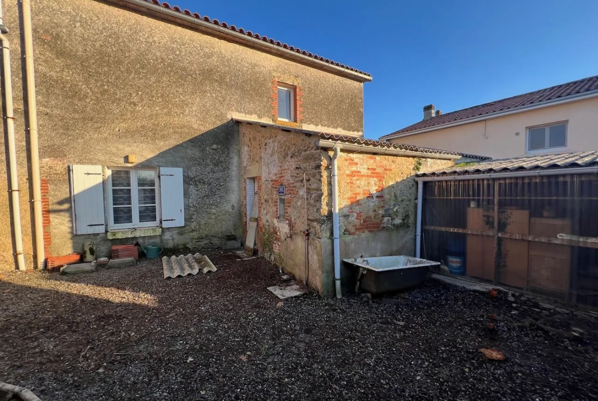 Maison à Cheffois avec possibilité d'extension et garage 