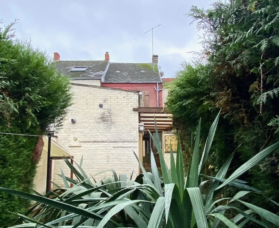 Maison en briques avec jardin et terrasse à Hautmont 