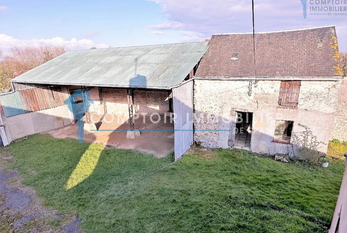 Propriété avec terrain et bâtiments à rénover à Aunay sous Auneau 