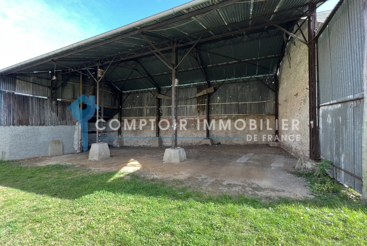 Propriété avec terrain et bâtiments à rénover à Aunay sous Auneau 