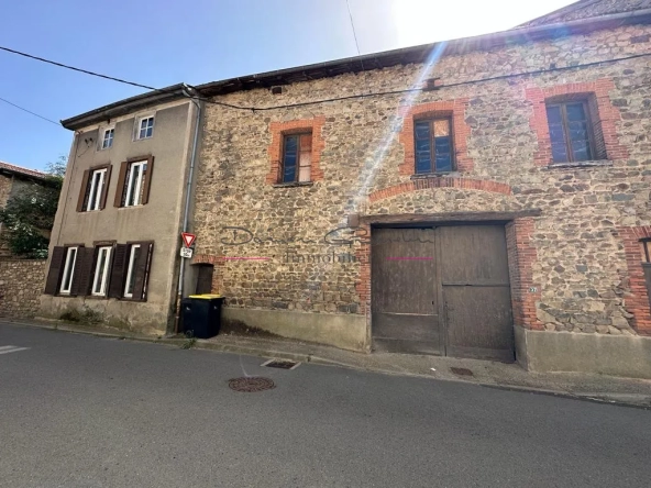 Maison de village avec garage et terrain attenant