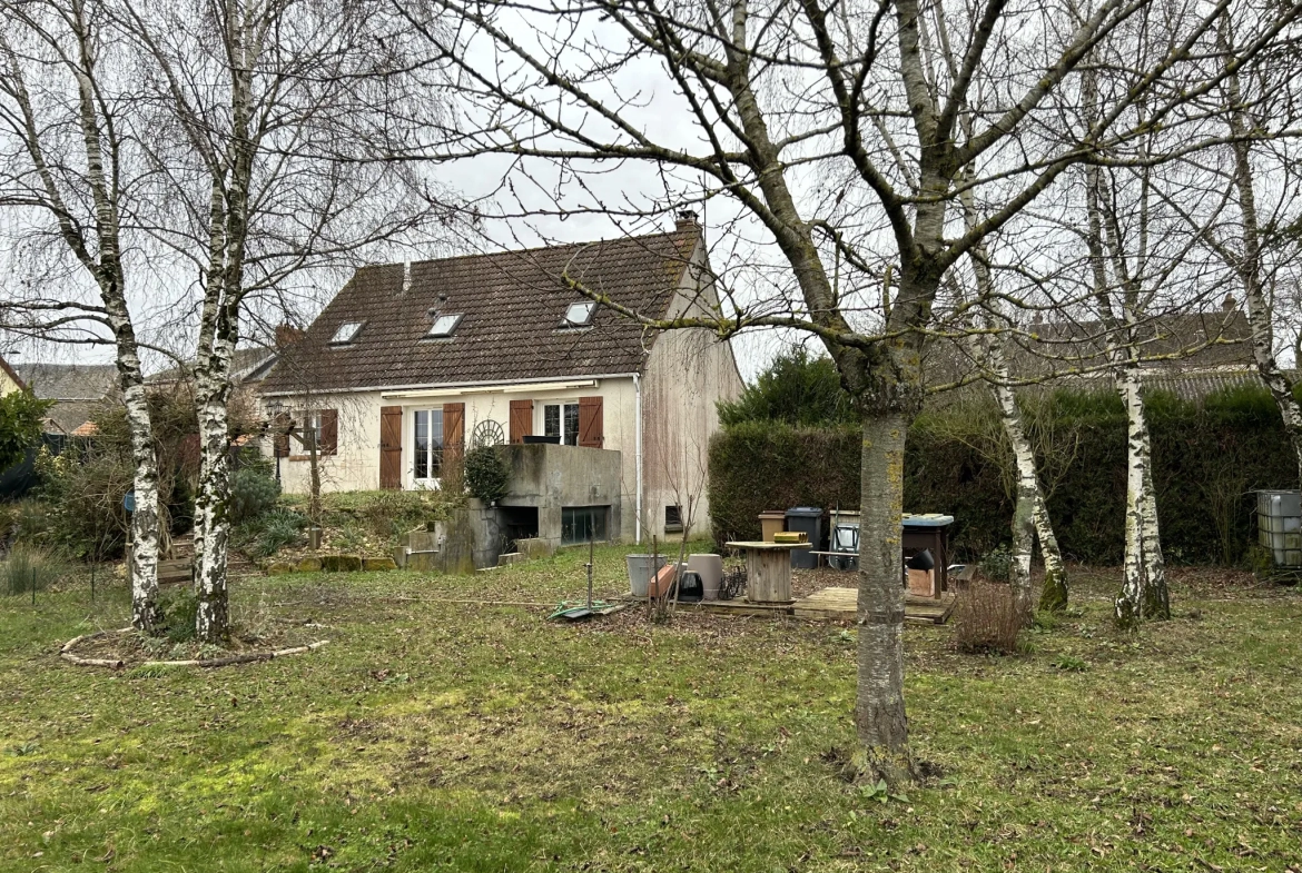 Maison à Sermaises avec 4 chambres et garage 