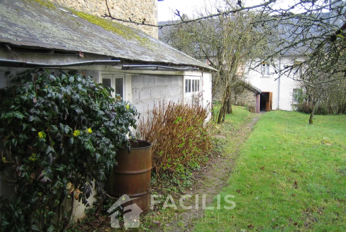 Maison avec trois chambres et terrain 