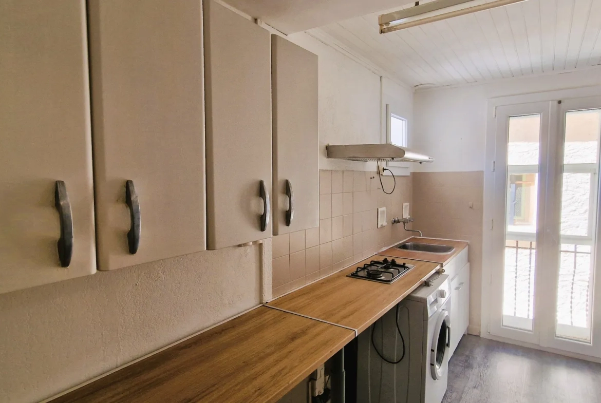 Immeuble avec 2 appartements de type T2 et balcon à Le Boulou 