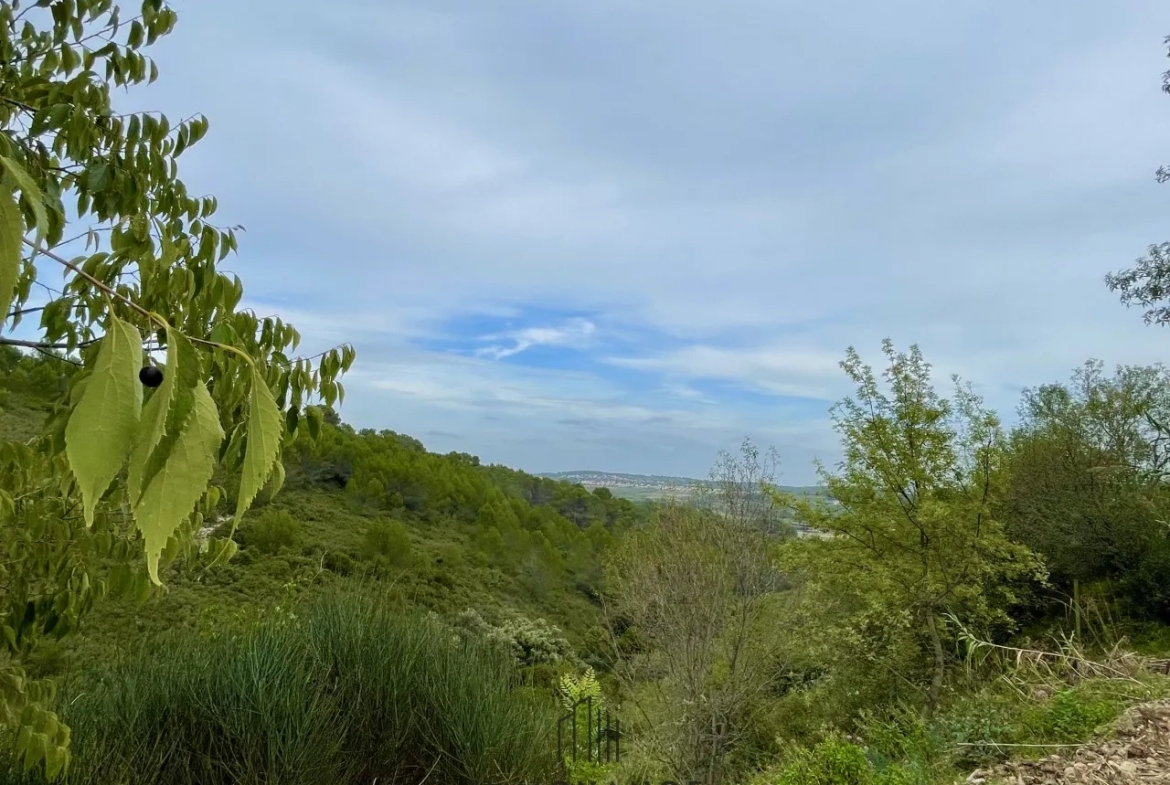 Terrain à bâtir de 1030m2 avec vue dégagée à Combbaillaux 