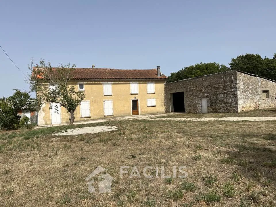 Maison en pierre avec grange et vaste terrain 