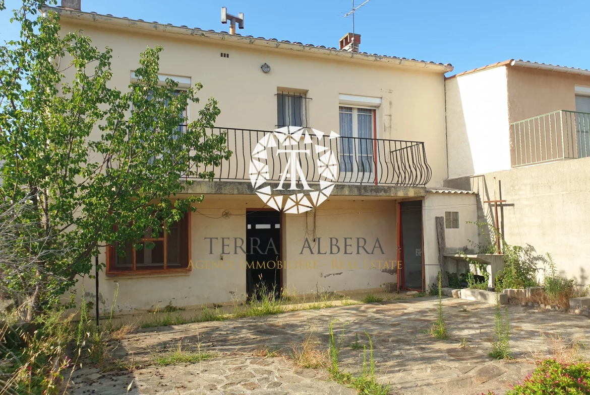 Maison 3 faces à vendre à St Genis des Fontaines avec jardin 