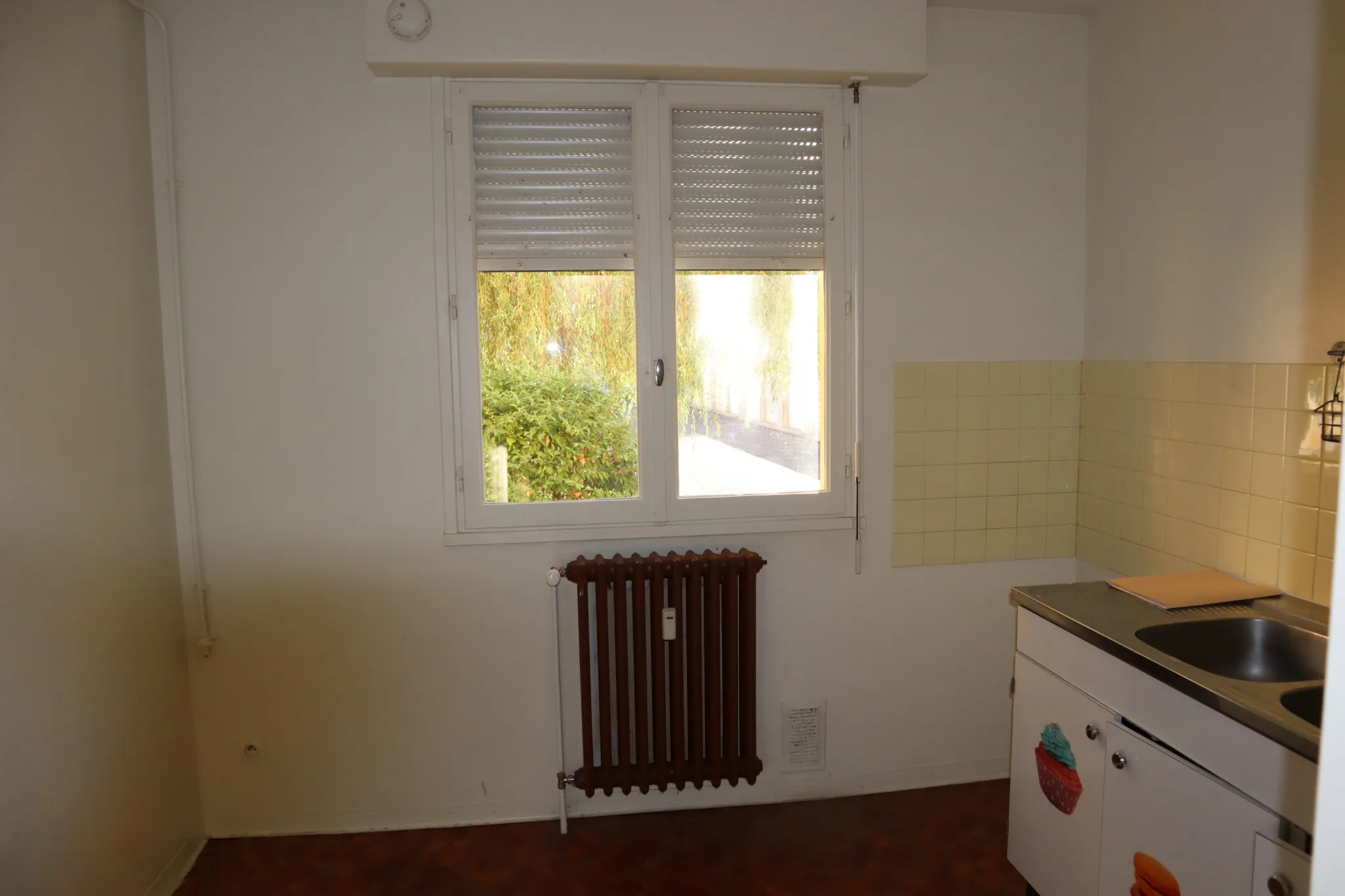 Appartement à rénover au rez-de-chaussée à Autun 