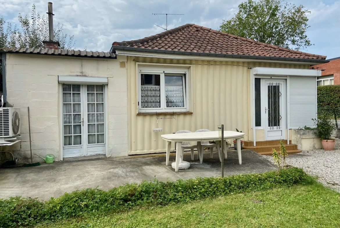 Résidence quasi de plain-pied avec jardin et garages spacieux à Maubeuge 