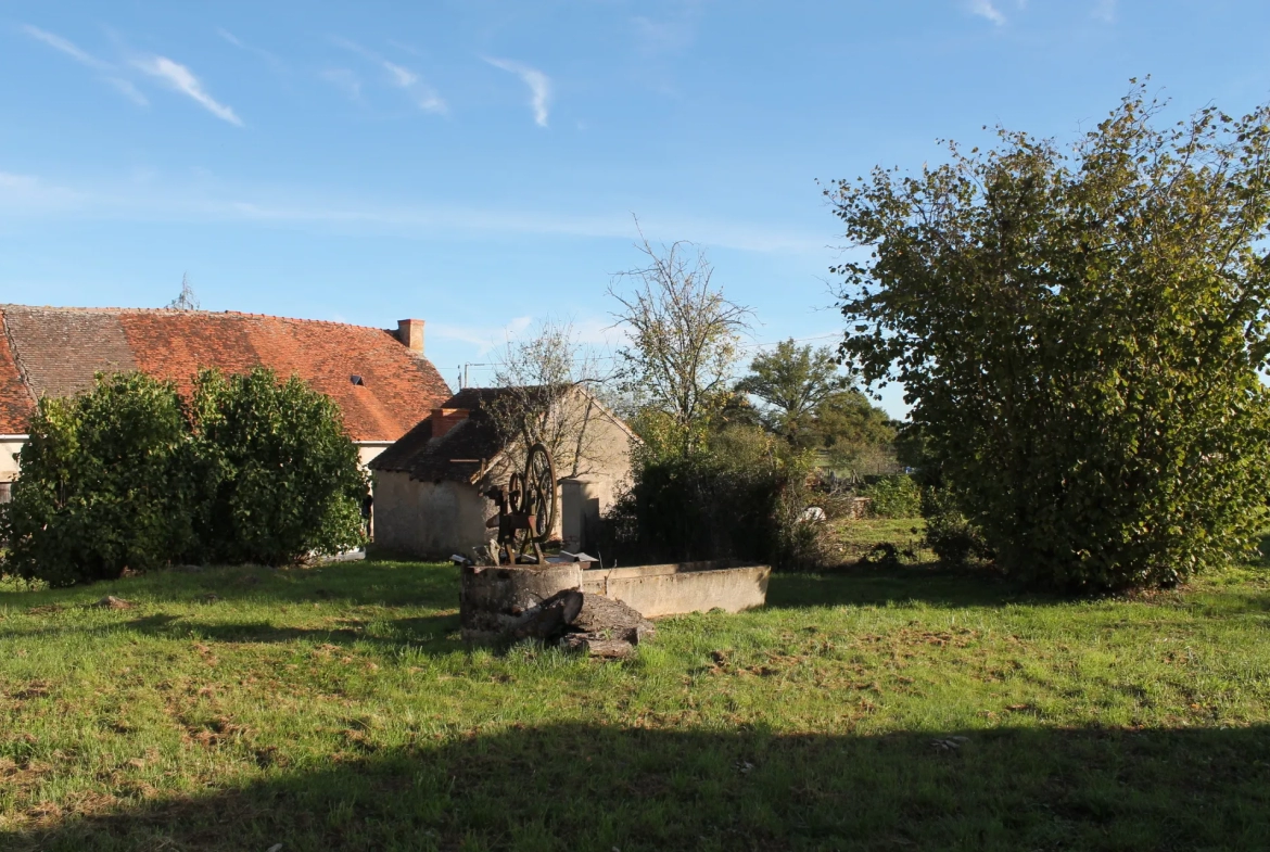 Fermette à Archignat avec granges sur terrain de 2540m2 