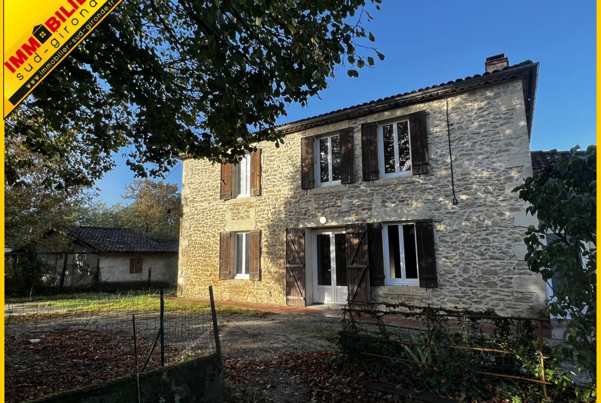 Maison de village en pierre avec jardin et dépendance à Langon 