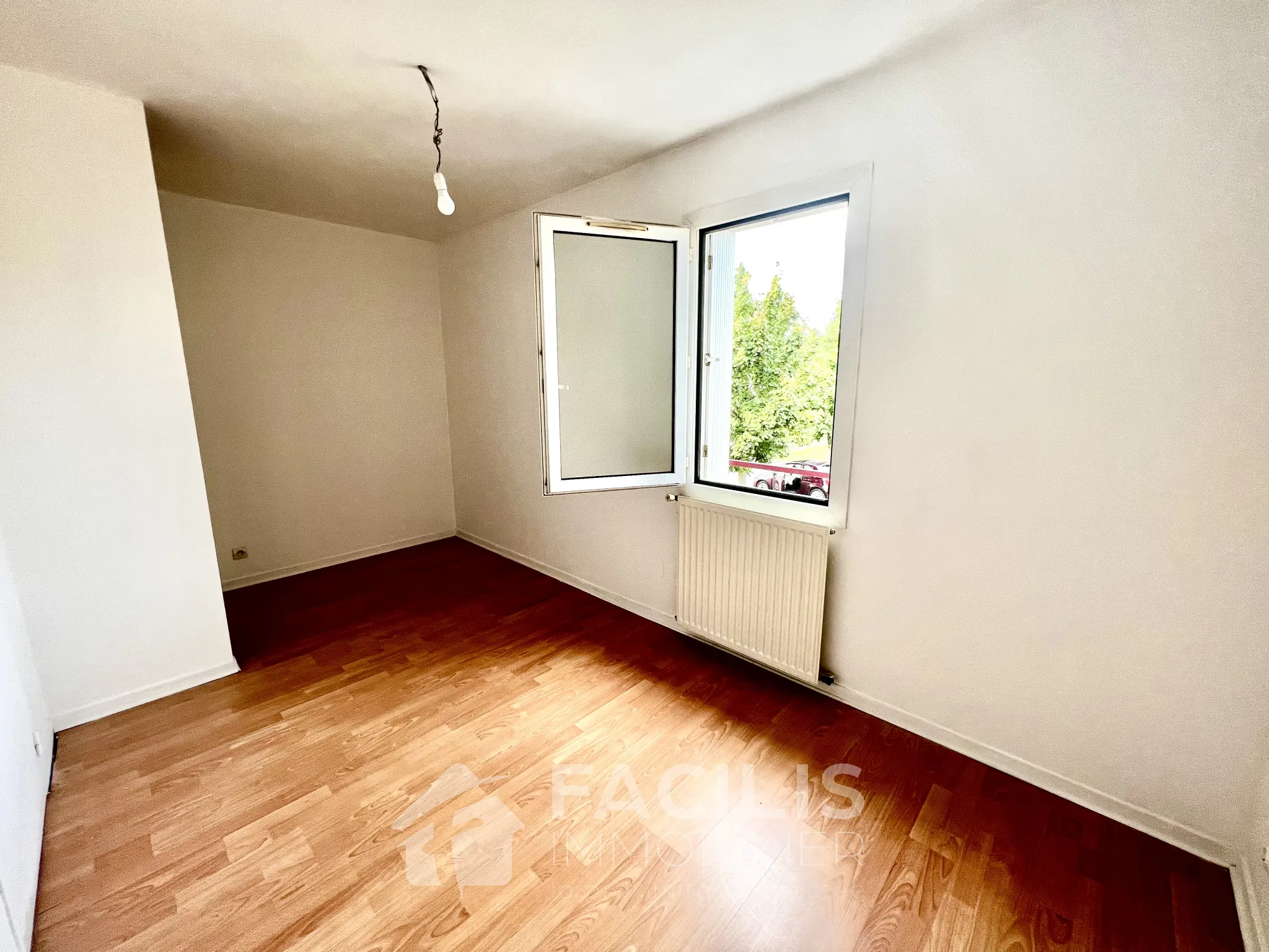 Maison à vendre à Buxerolles (86180) - 2 chambres, 63 m2, jardinet exposé sud 