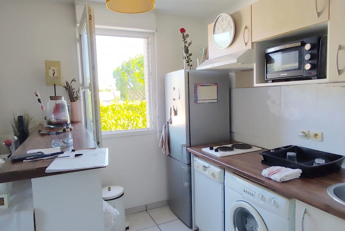 Appartement T2 déjà loué avec terrasse et parking à Carcassonne 