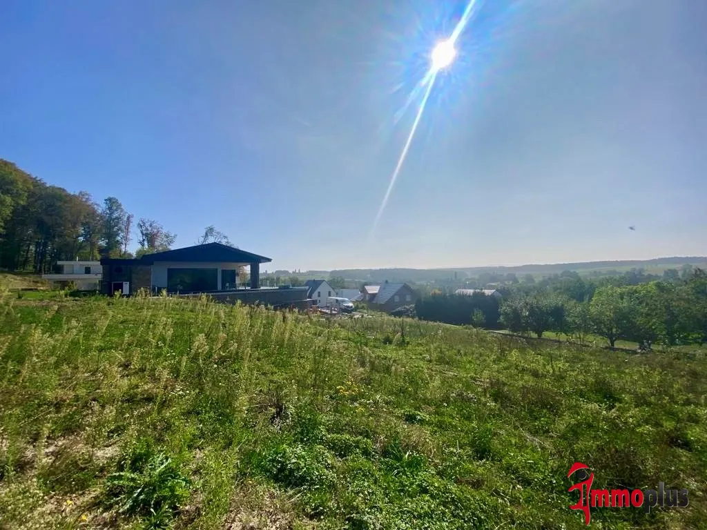 Magnifique terrain avec vue imprenable sur le Jura à Muespach 