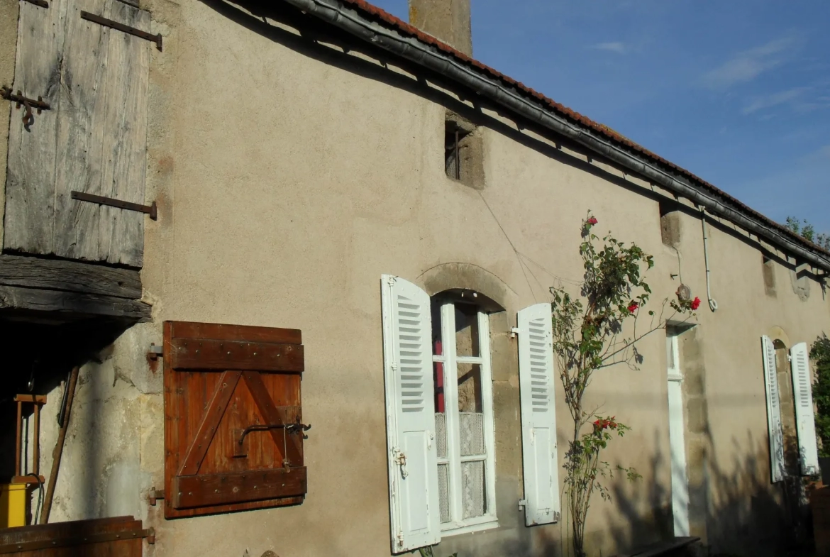 Maison avec grande grange sur terrain avec vue dégagée 