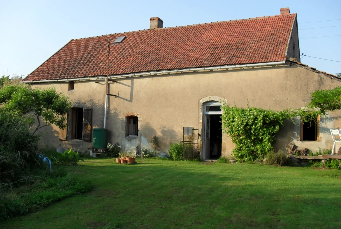 Maison avec grande grange sur terrain avec vue dégagée 