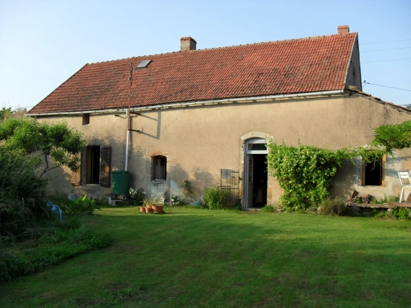 Maison avec grande grange sur terrain avec vue dégagée