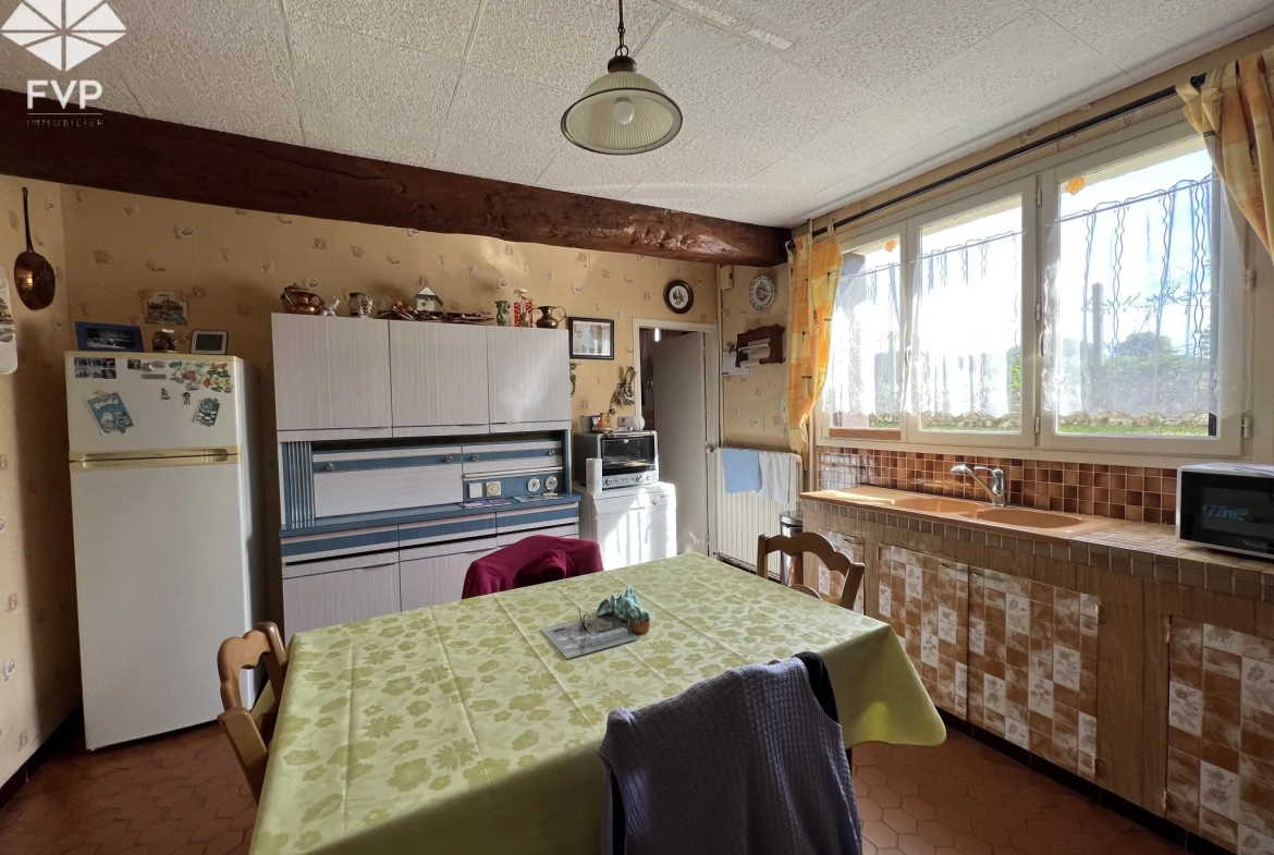 A vendre habitation plein pied, 3chambres, 2 garages, terrain 1000m2 