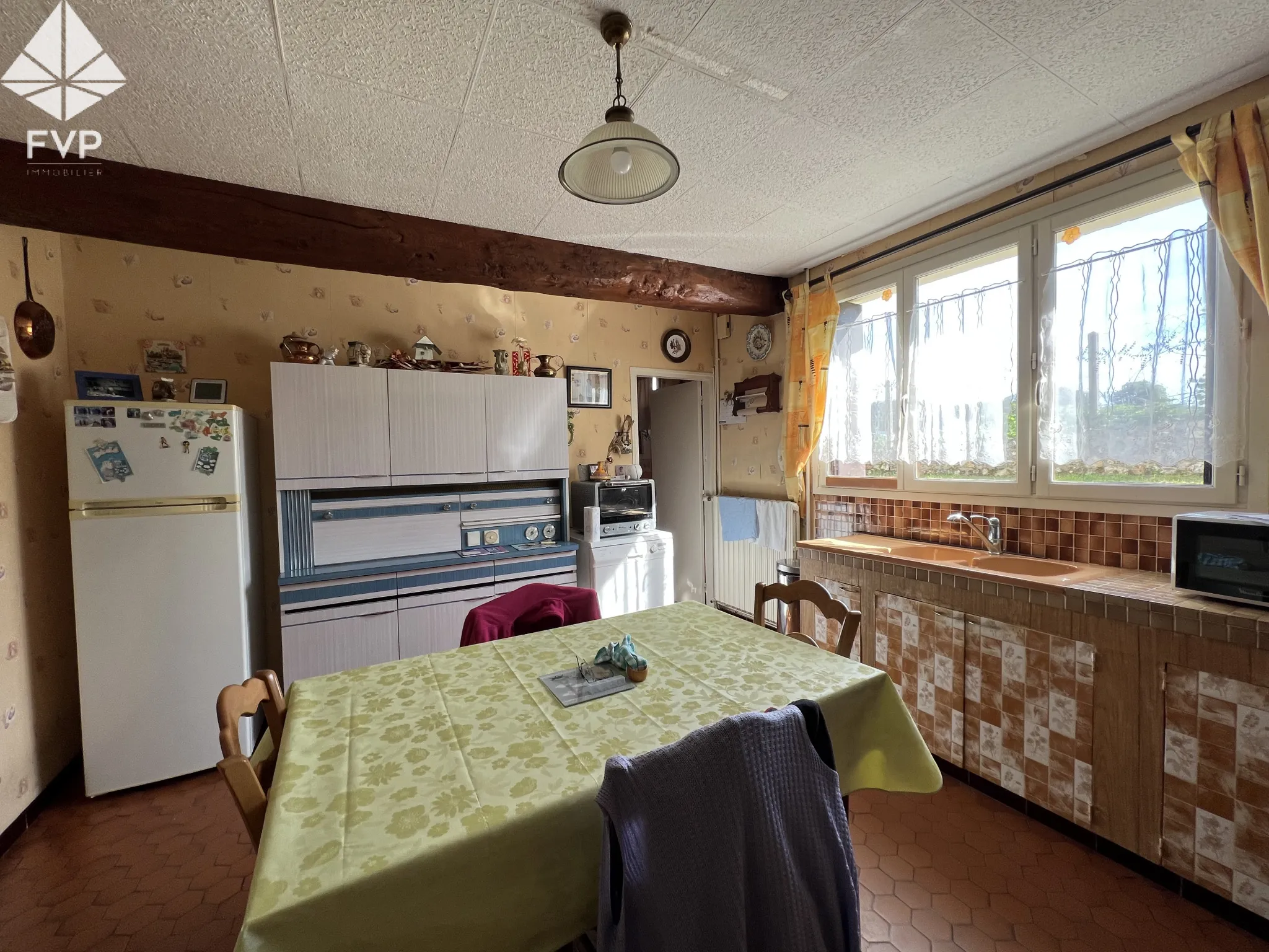 A vendre habitation plein pied, 3chambres, 2 garages, terrain 1000m2 