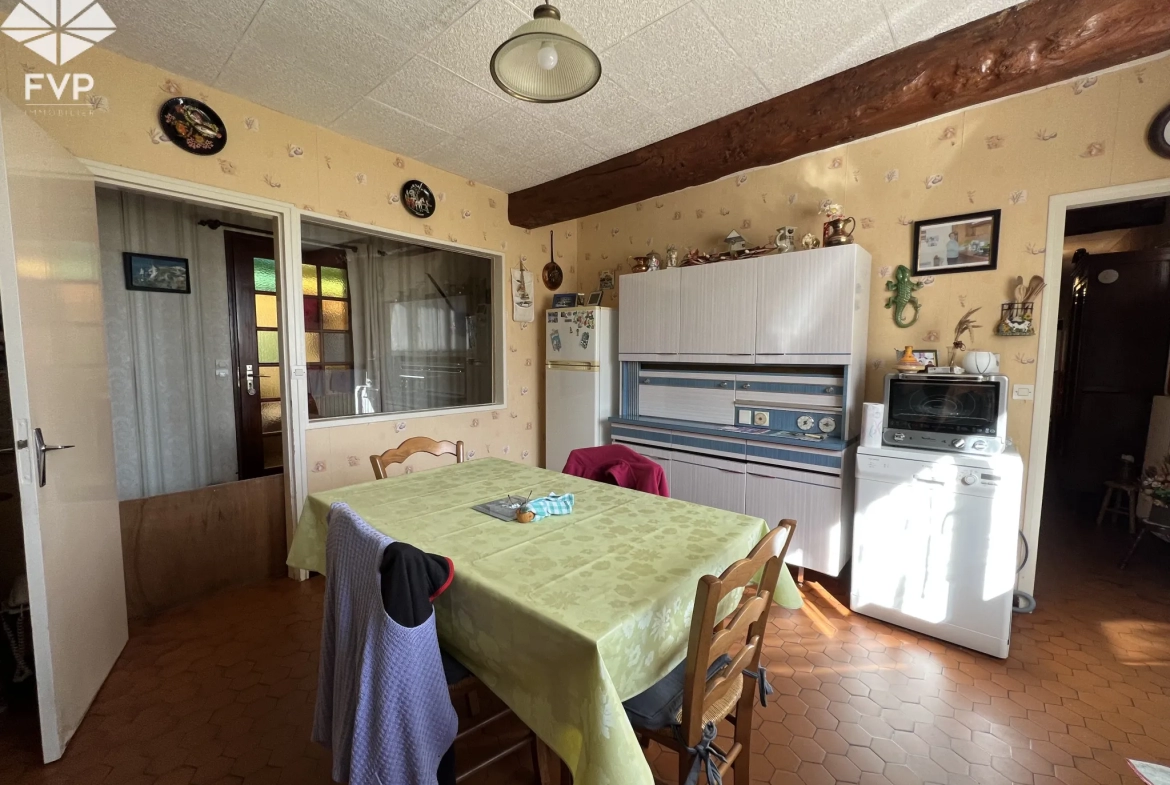 A vendre habitation plein pied, 3chambres, 2 garages, terrain 1000m2 