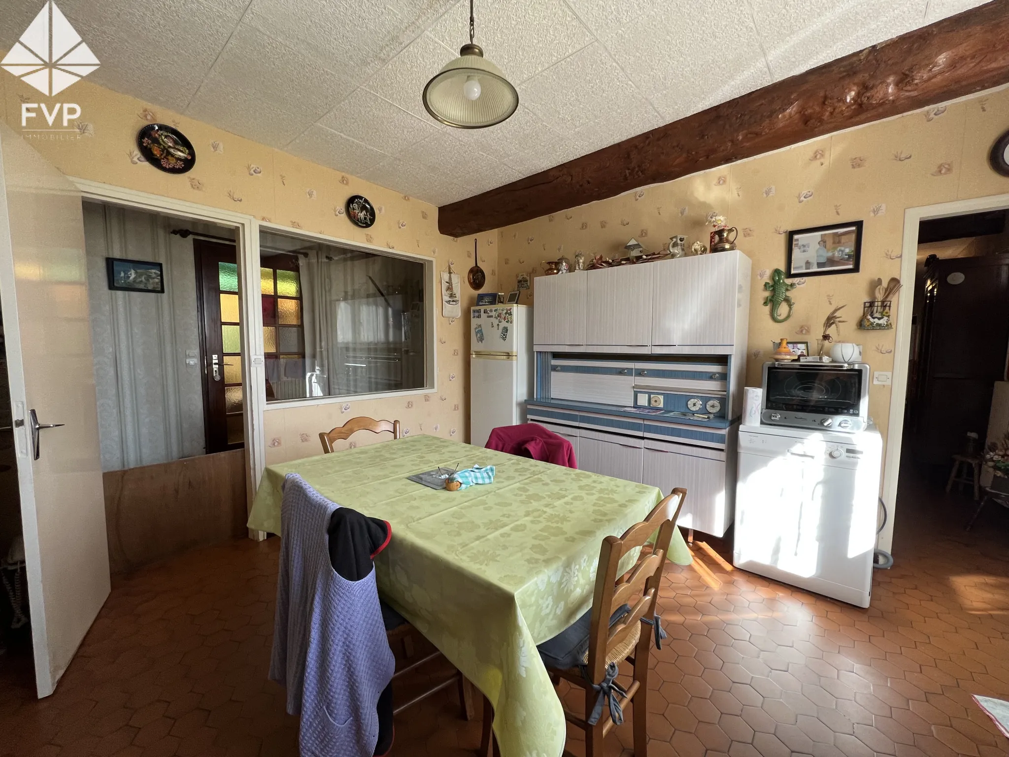 A vendre habitation plein pied, 3chambres, 2 garages, terrain 1000m2 