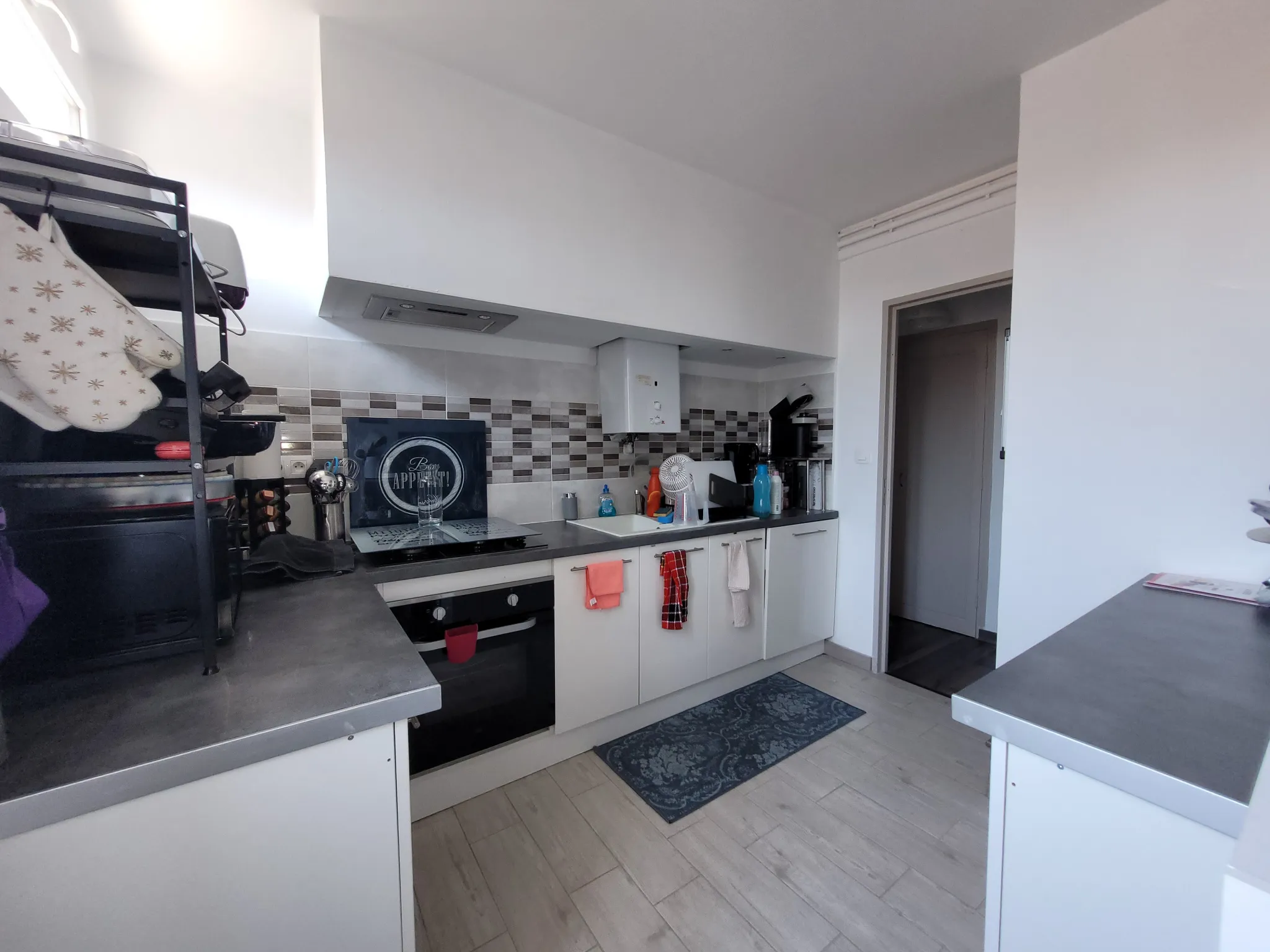 Appartement T3 avec balcon, cellier et parking 