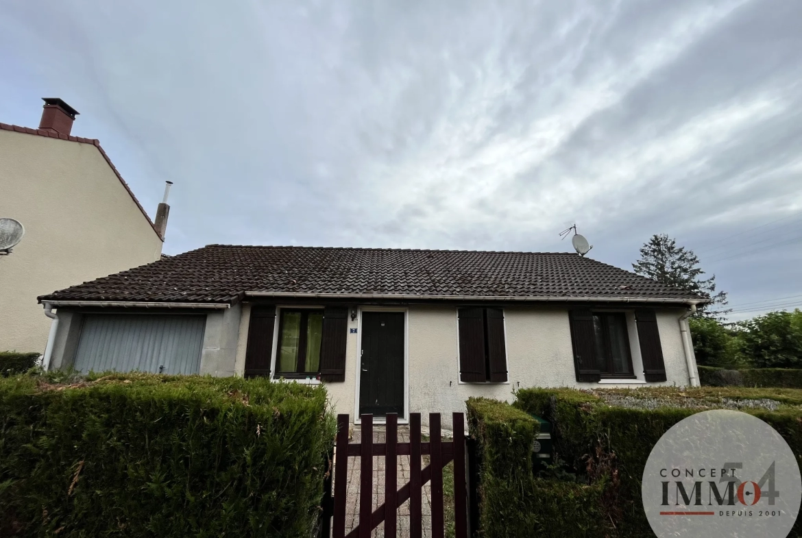 Pavillon à rénover avec garage et jardin à Dieulouard 