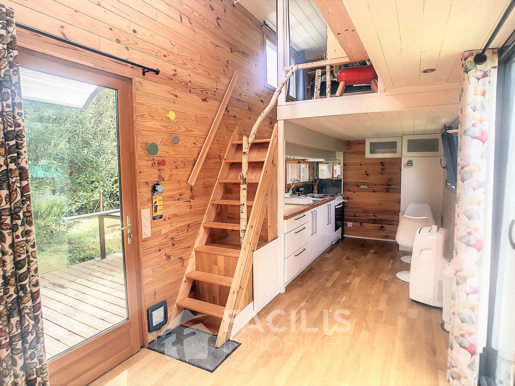 Terrain à bâtir avec Tiny House incluse à Idron 