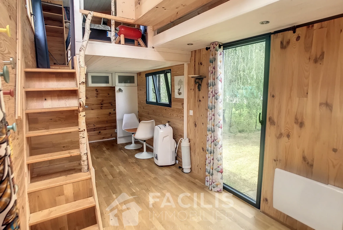 Terrain à bâtir avec Tiny House incluse à Idron 