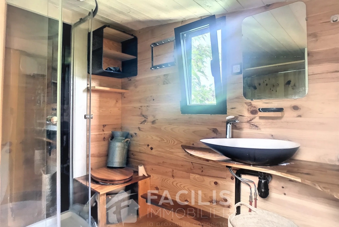 Terrain à bâtir avec Tiny House incluse à Idron 