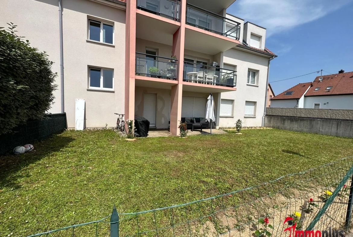 Appartement F3 avec terrasse, jardin clos de 113m2, garage, cave et stationnement 