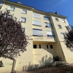 Appartement avec balcon, cave, grenier et parcelle de terrain