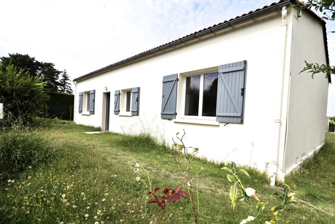 Médis maison - Maison de plain-pied avec trois chambres et garage 