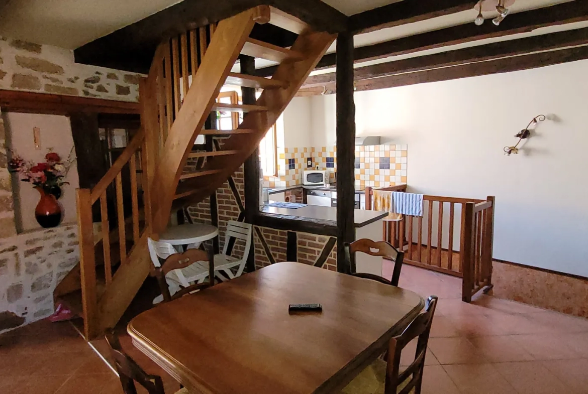 Maison en pierre avec balcon et garage à Beaulieu-sur-Dordogne 