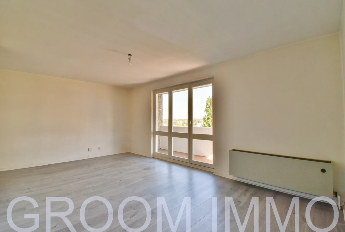 Appartement T2 de 49 m2 avec balcon et 2 places de parking sécurisées en sous-sol 