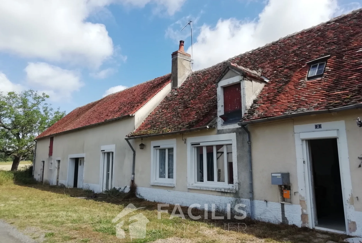 Longère type F2 avec grange attenante et 500 m2 de terrain à La Guerche sur l'Aubois 