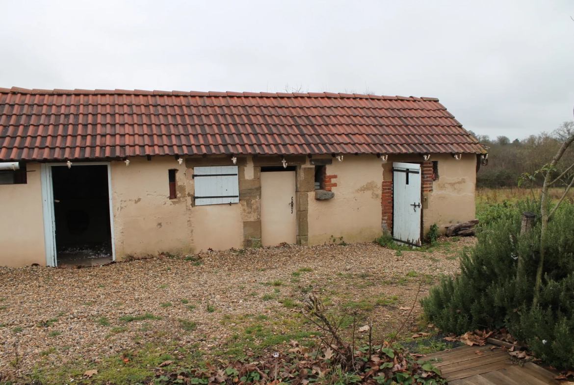 Fermette à St Caprais avec environ 1 hectare de terrain 