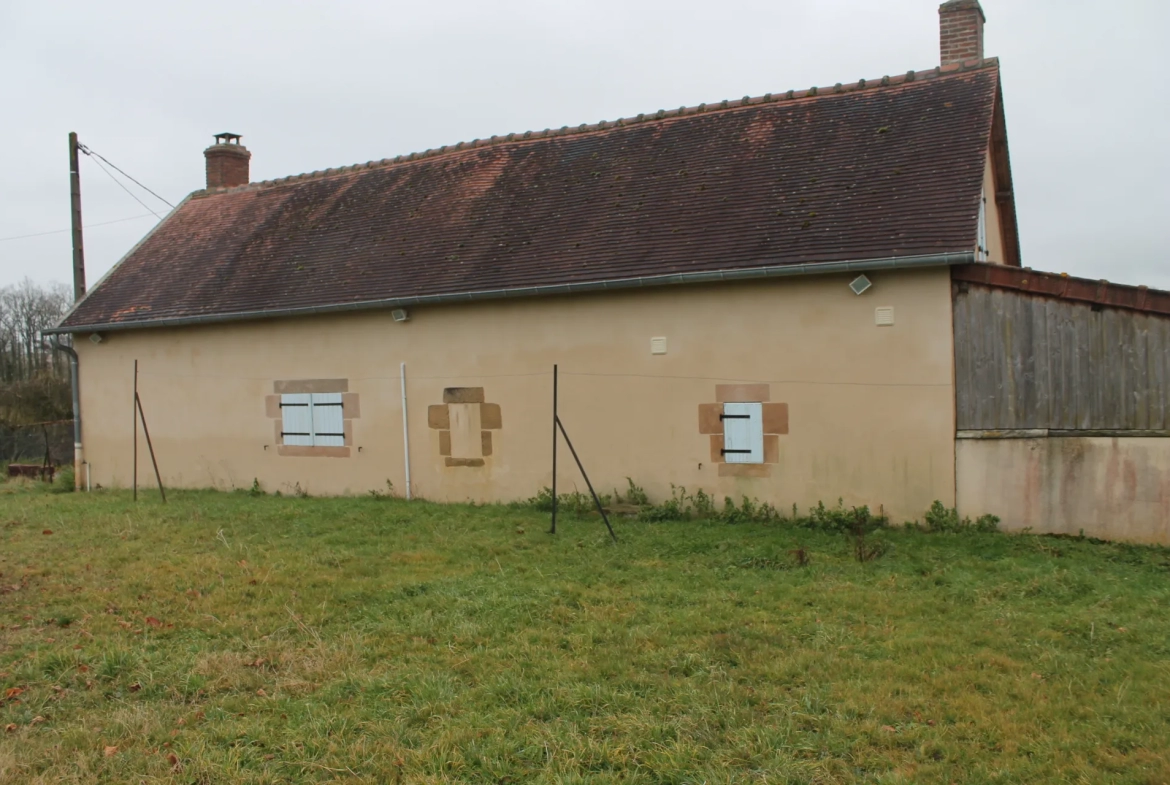 Fermette à St Caprais avec environ 1 hectare de terrain 