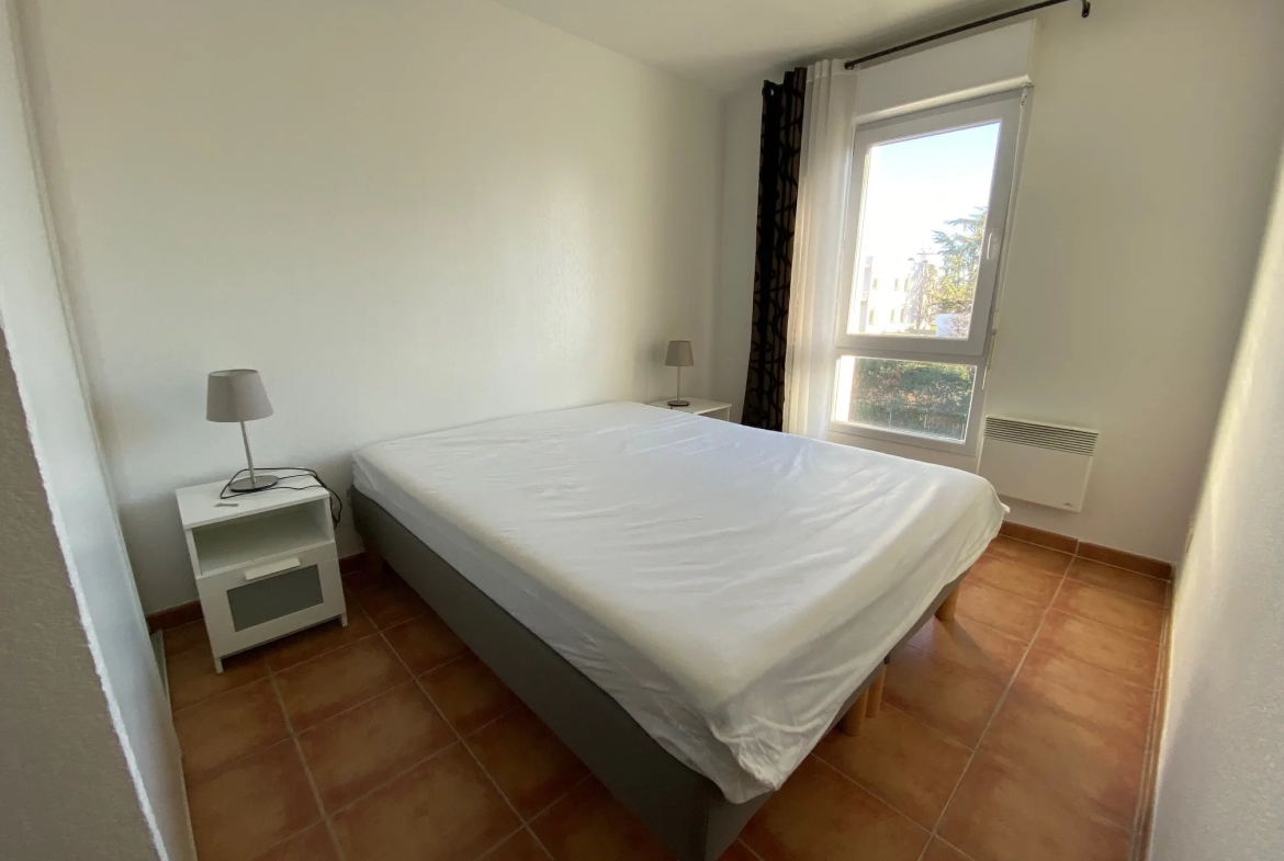 Appartement T2 47m2 avec terrasse et parking à Nimes 