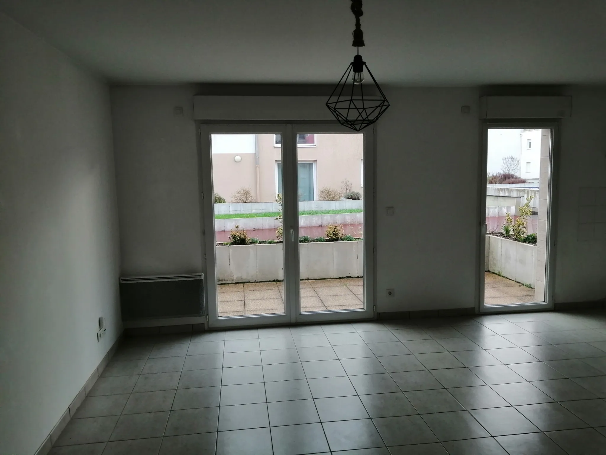 Appartement à Avrillé - 63 m2 avec 2 chambres, terrasse et garage 