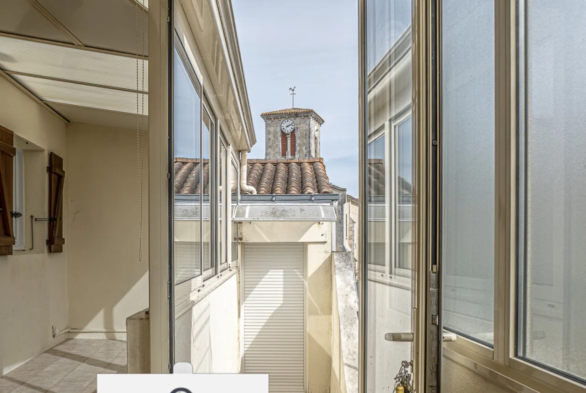 Appartement au cœur du centre-ville de La Tranche-sur-Mer avec vue sur la place du village 