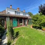 Maison semi individuelle des années 60 avec garage et jardin à Hem