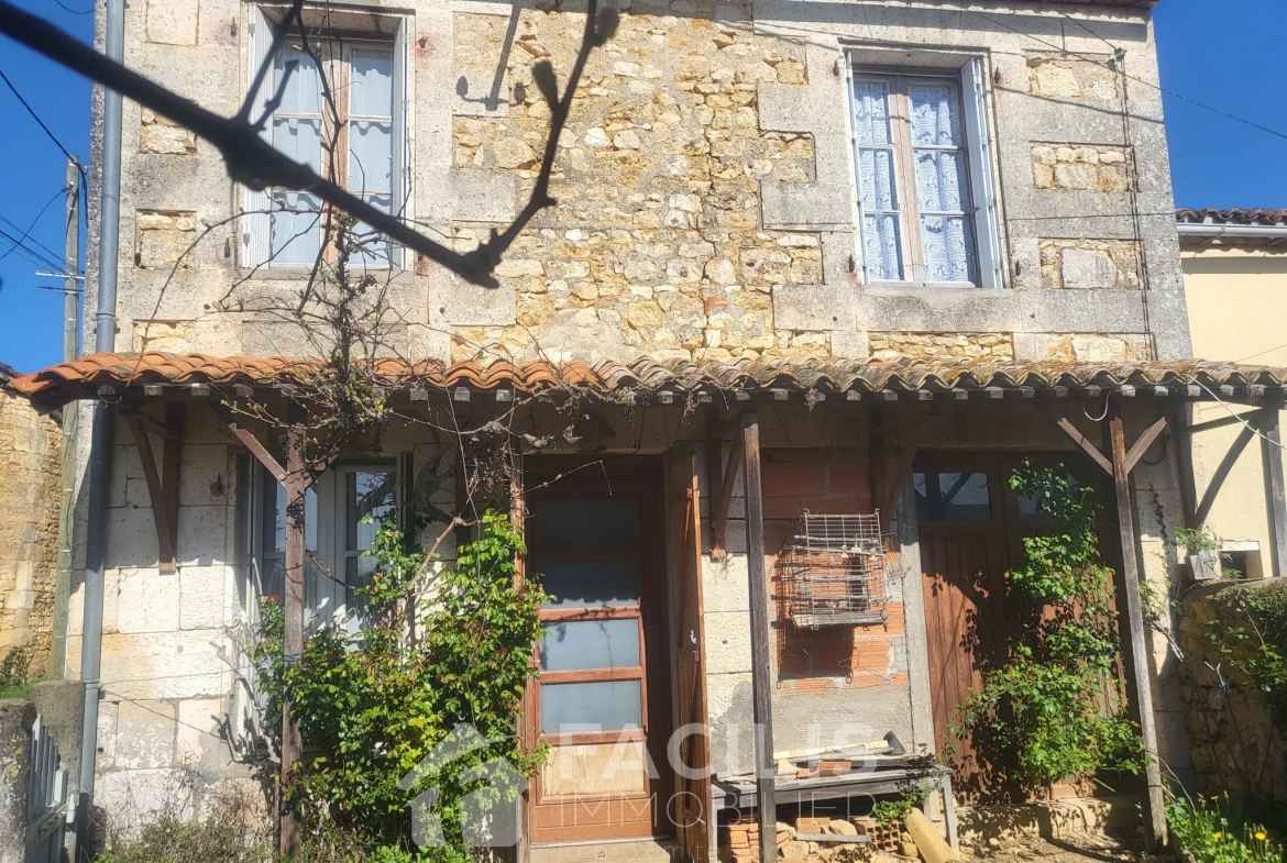 Charmante grange en pierre apparente avec maison d'habitation à Chazelles 