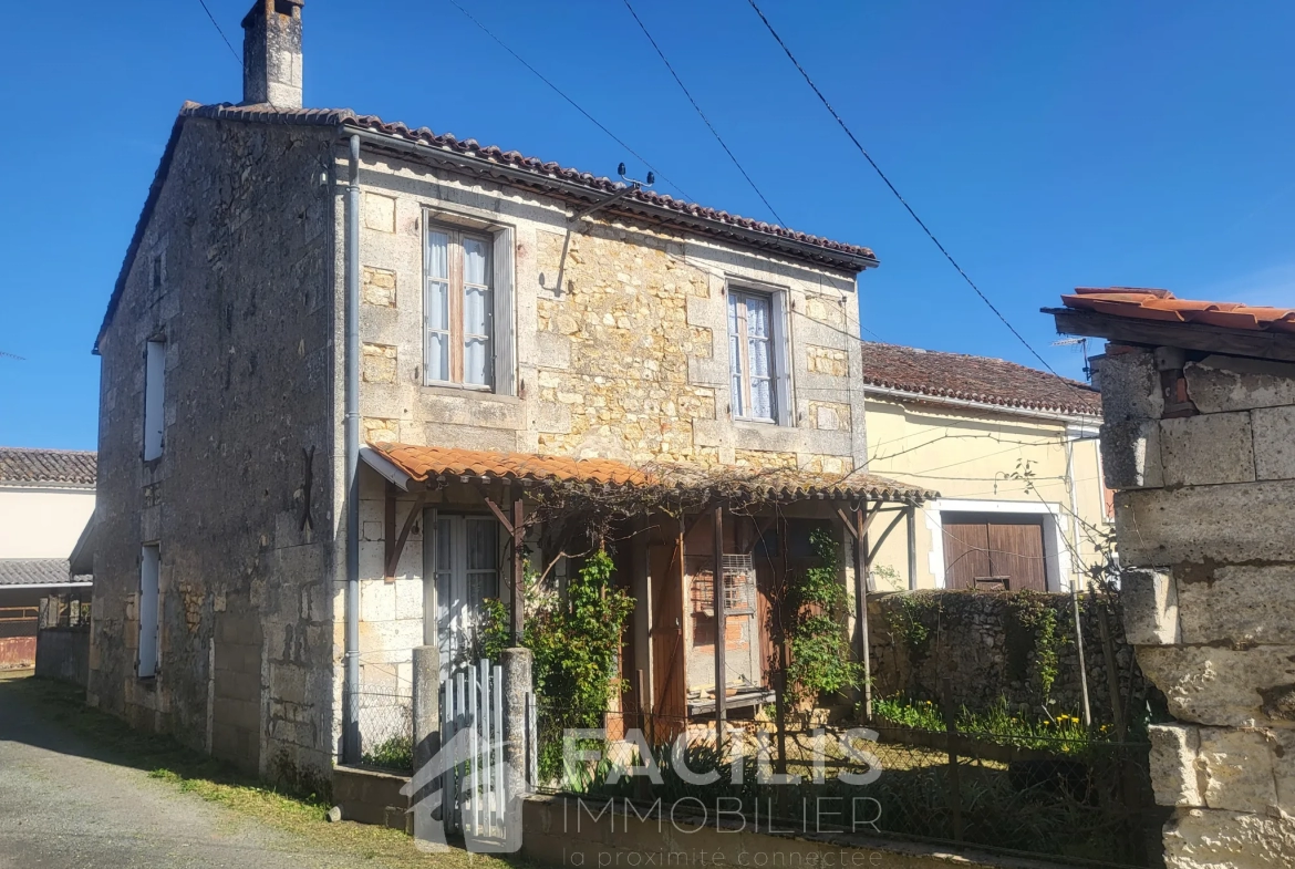 Charmante grange en pierre apparente avec maison d'habitation à Chazelles 